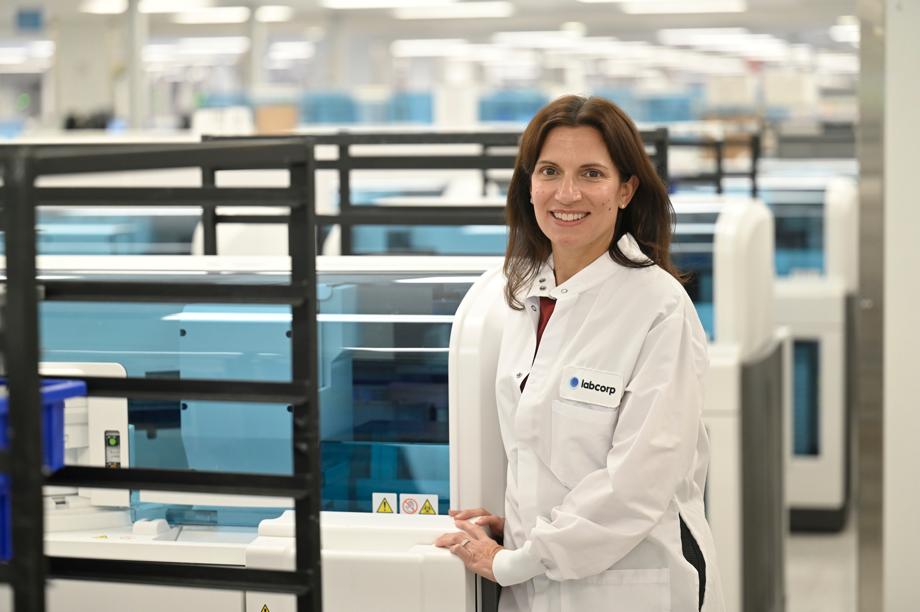 Provider extracting a vaccine from a vail into a needle